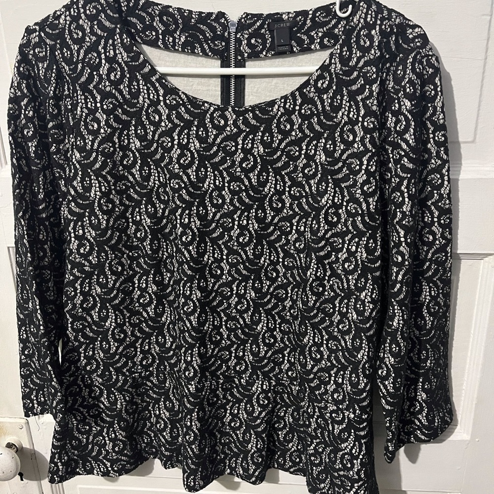 Size L. Peplum Top. 3/4 Sleeve